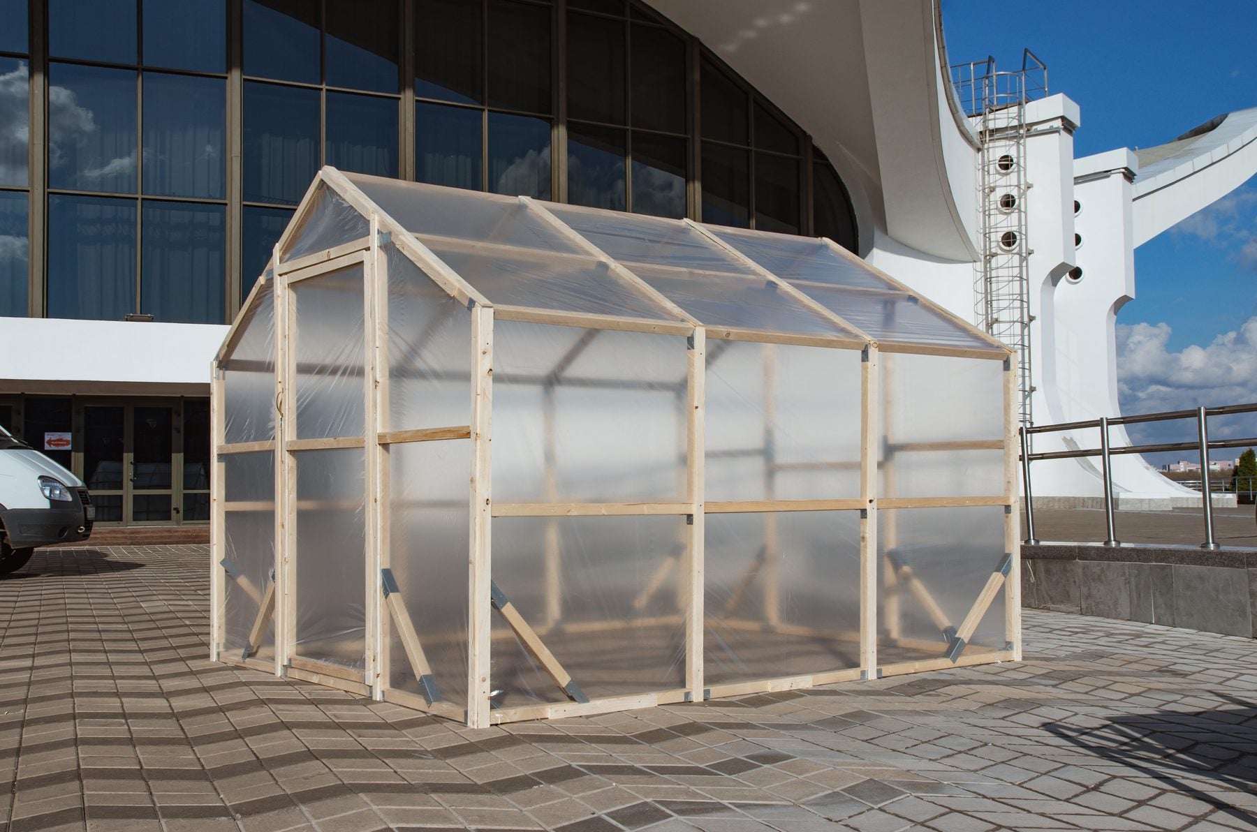 NORDIC wooden greenhouse from the side, pine frame and twin-wall polycarbonate