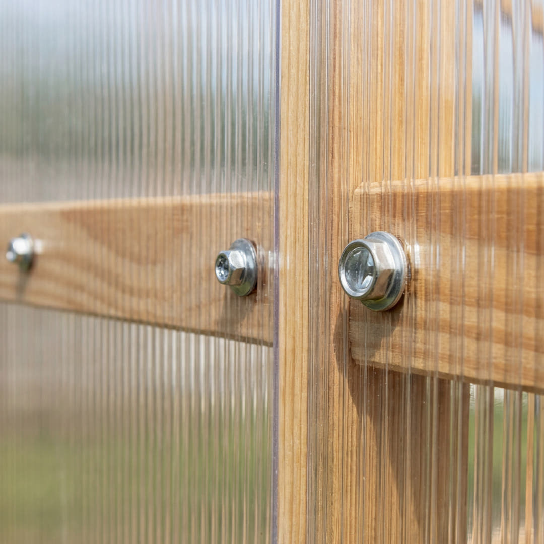 Screw-fixed polycarbonate panels — Waldenhaus NORDIC greenhouse, no W-clips