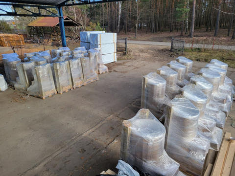 Rows of packed and wrapped pallets in the factory yard